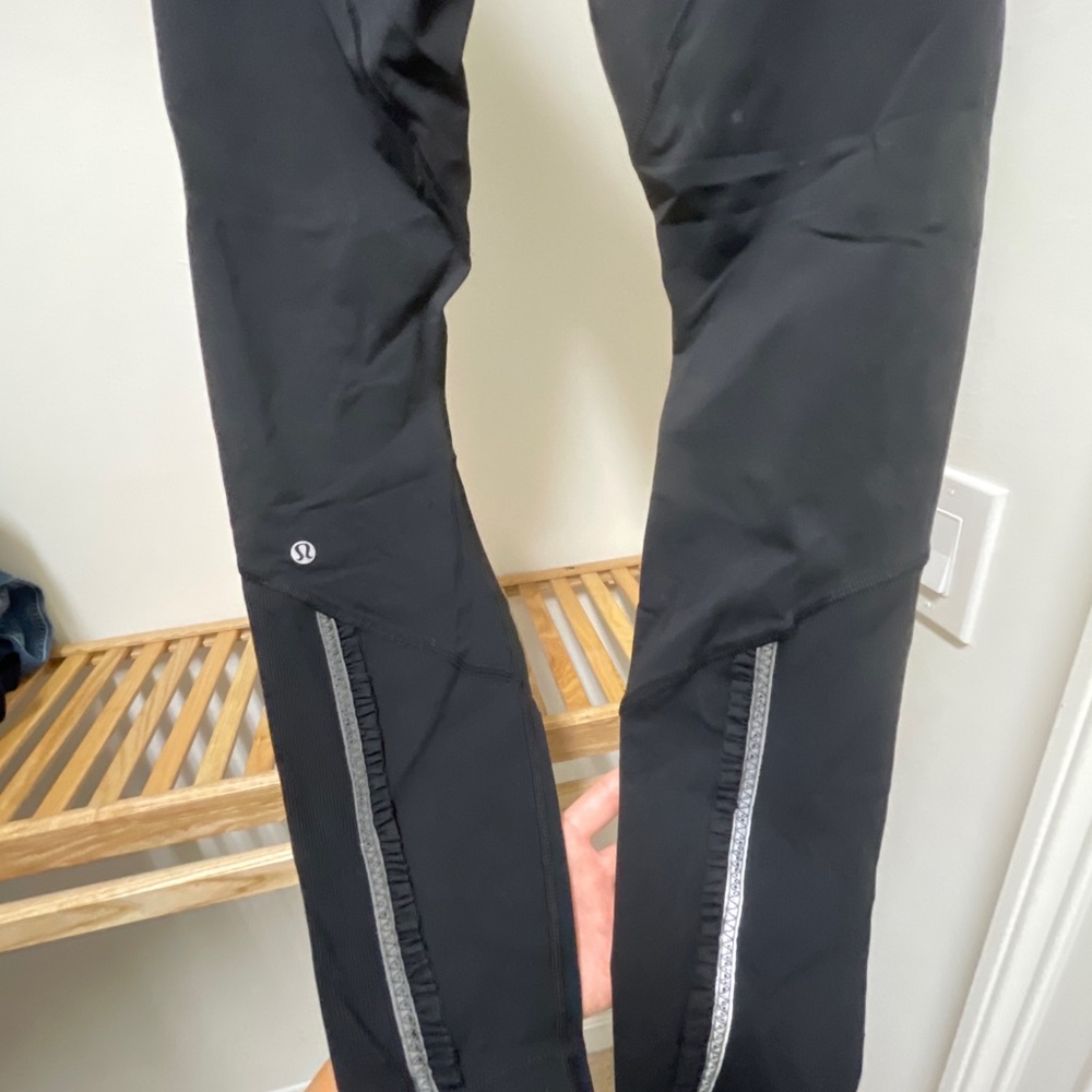 Lululemon black leggings with ruffles! Very cute hardly used. Size 10.